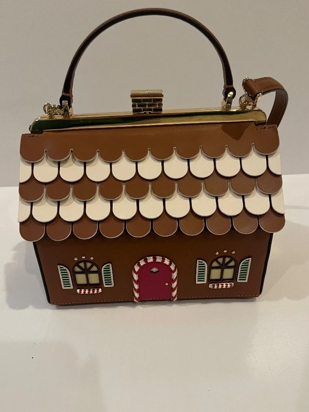 Kate Spade Gingerbread house clasp purse